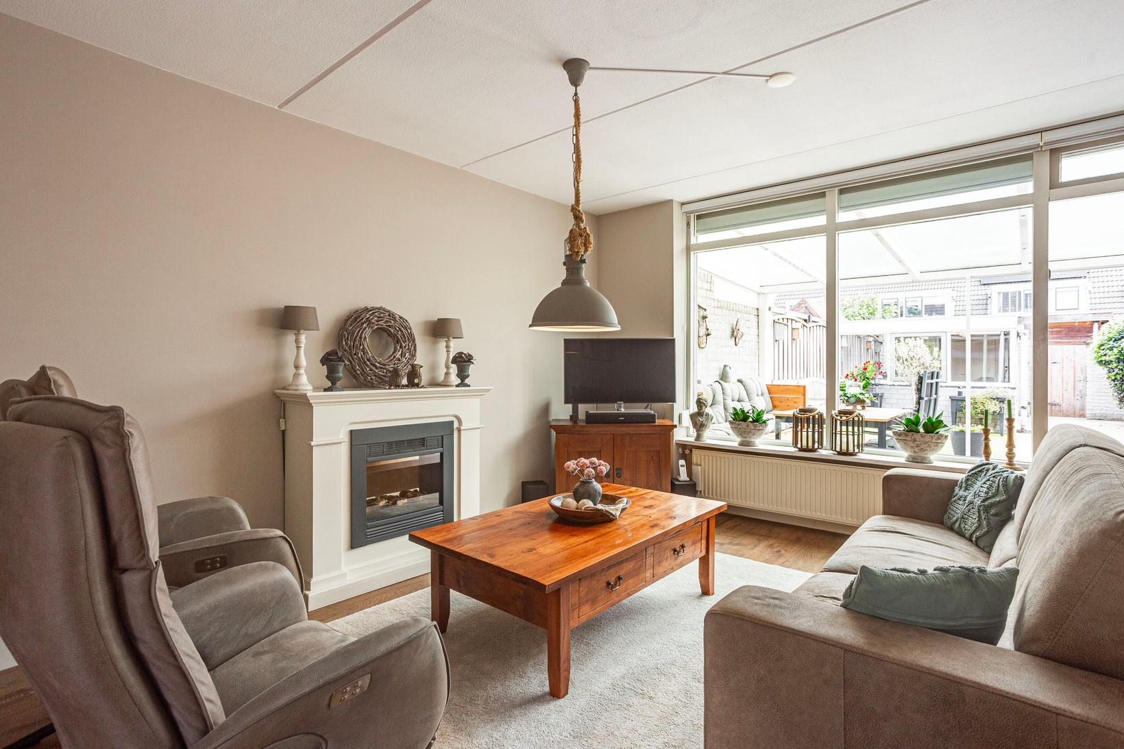 Tussenwoning te koop: Kennedydreef 17, Ede