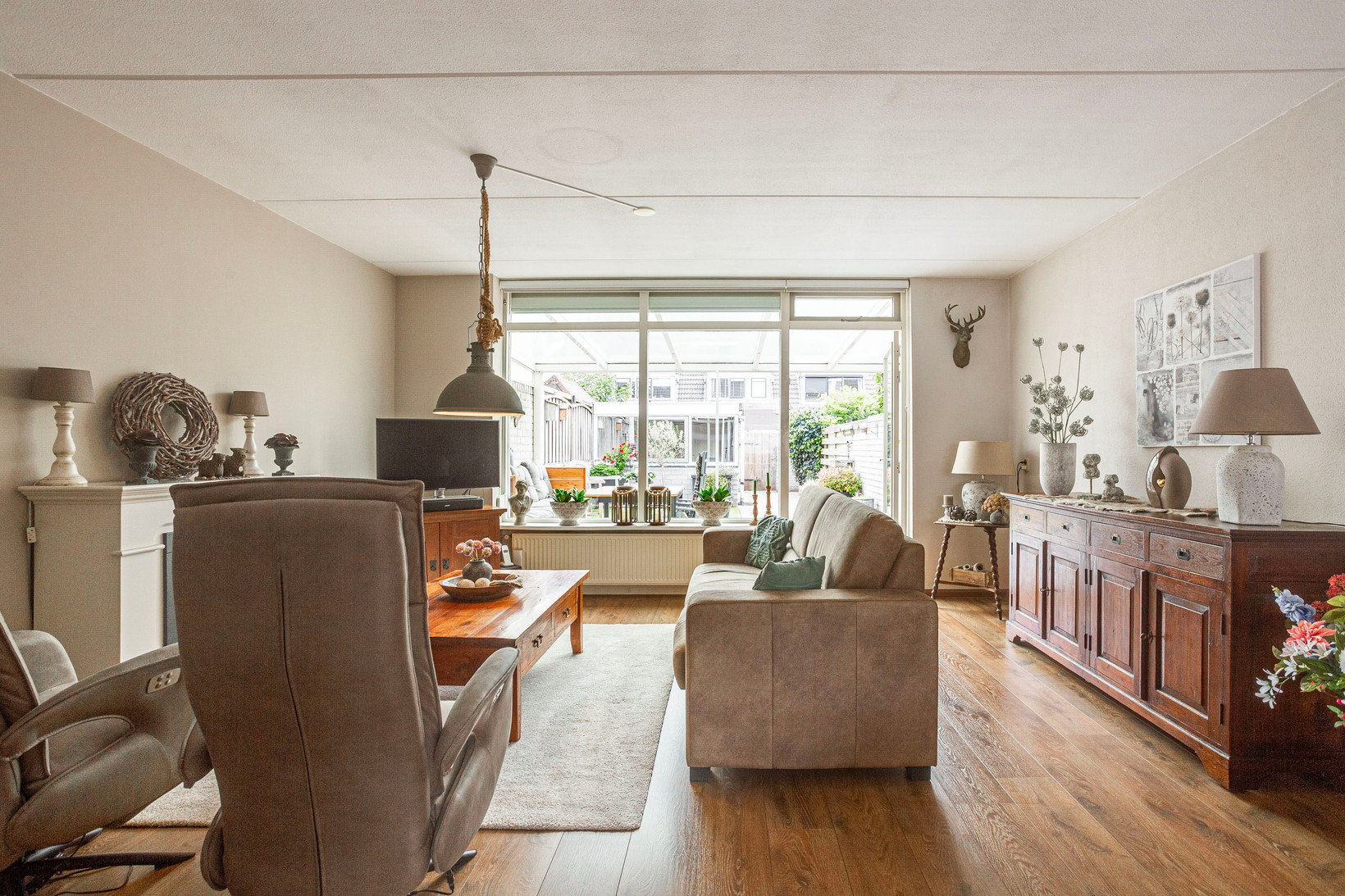 Tussenwoning te koop: Kennedydreef 17, Ede