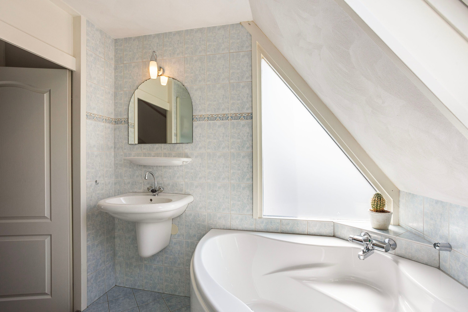 Tussenwoning te koop: Kennedydreef 17, Ede