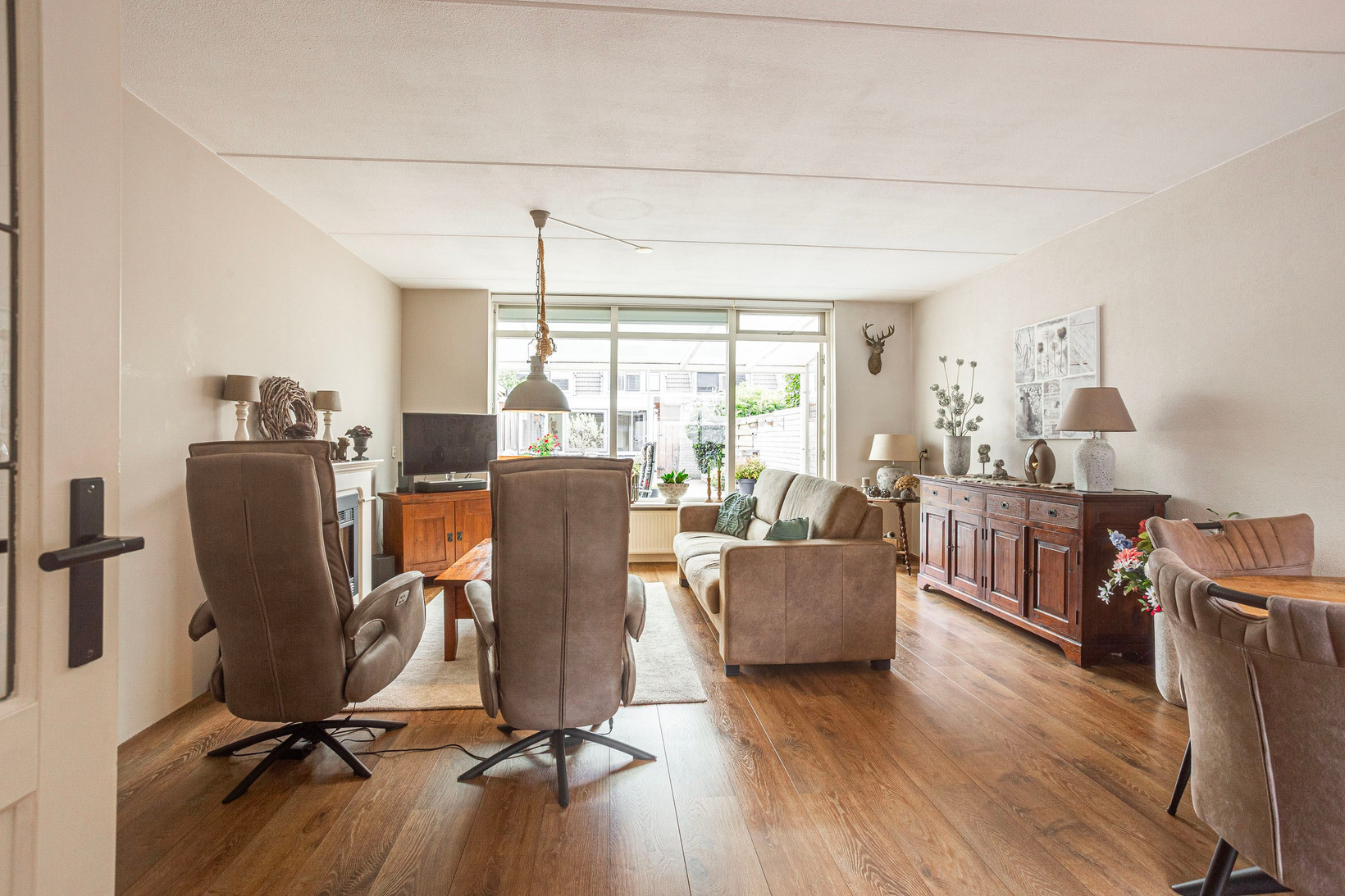 Tussenwoning te koop: Kennedydreef 17, Ede