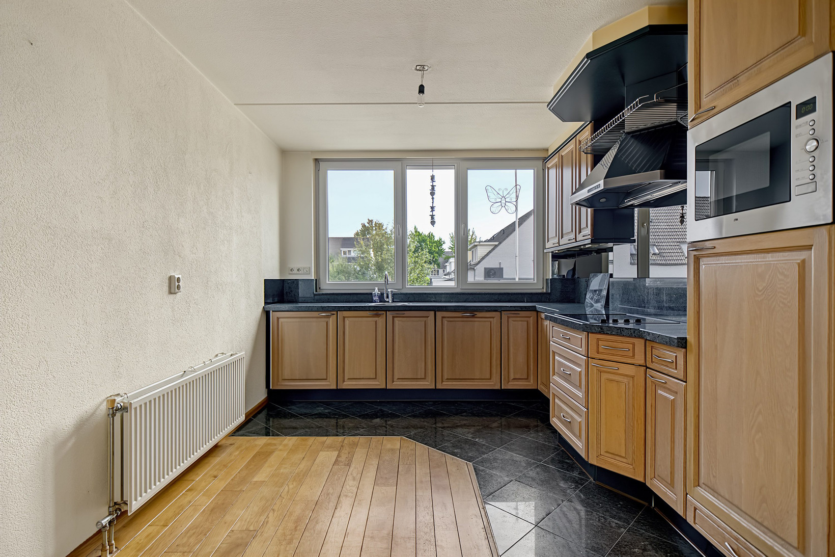 Tussenwoning te koop: Martin Luther Kingstate 84, Ede