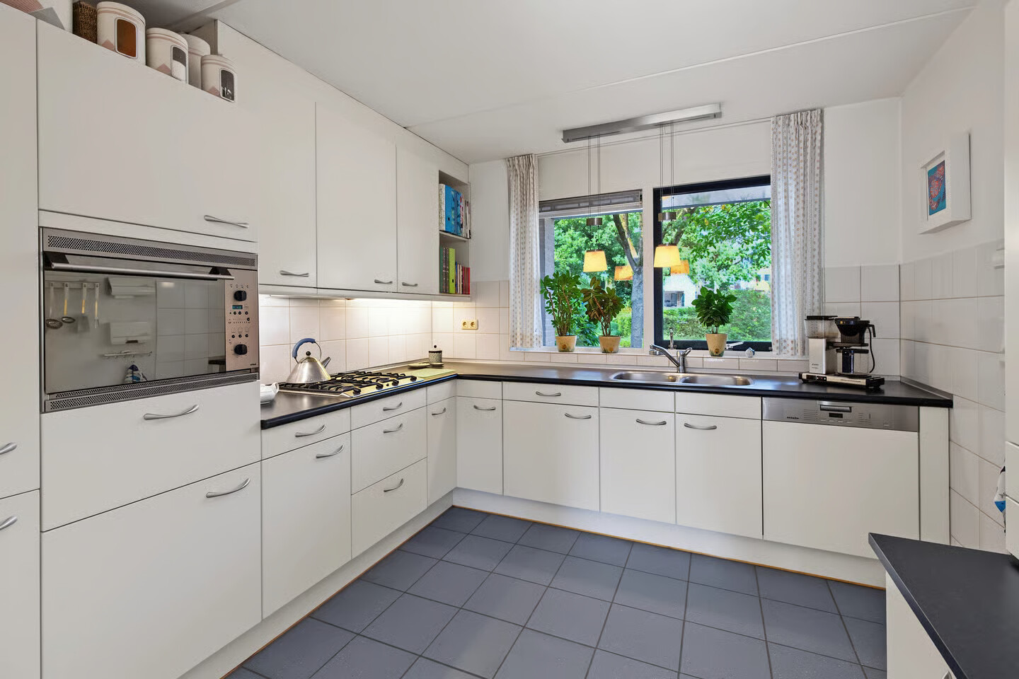 Tussenwoning te koop: Erasmusstate 69, Ede