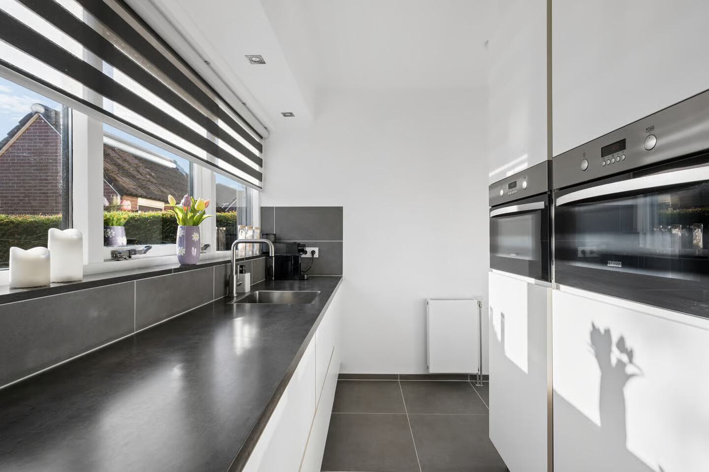 Tussenwoning te koop: Karssenstraat 20, Ede