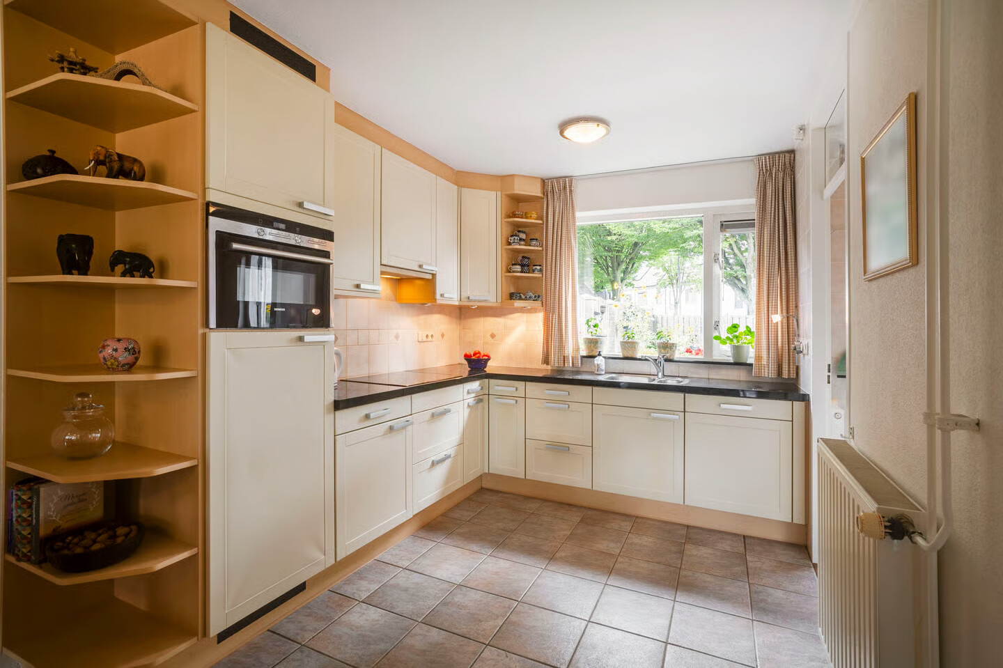 Tussenwoning te koop: Rubensstraat 14, Ede