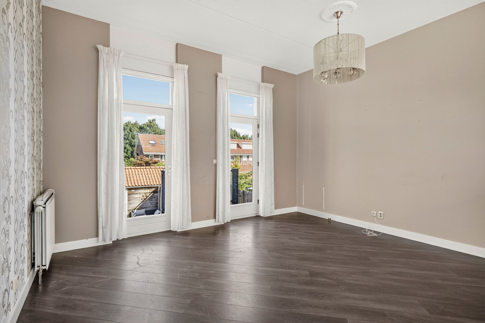 Tussenwoning te koop: Laan van Kernhem 211, Ede
