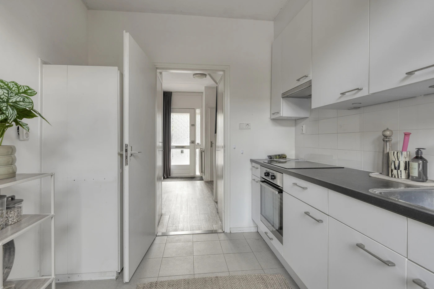 Tussenwoning te koop: De Olmen 28, Zevenaar