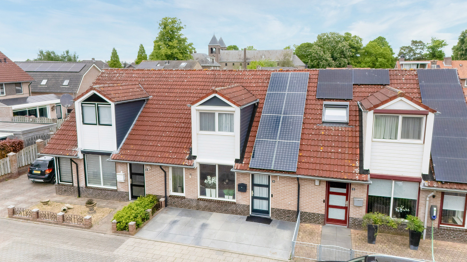 Tussenwoning te koop: Kerkstraat 14, Spijk