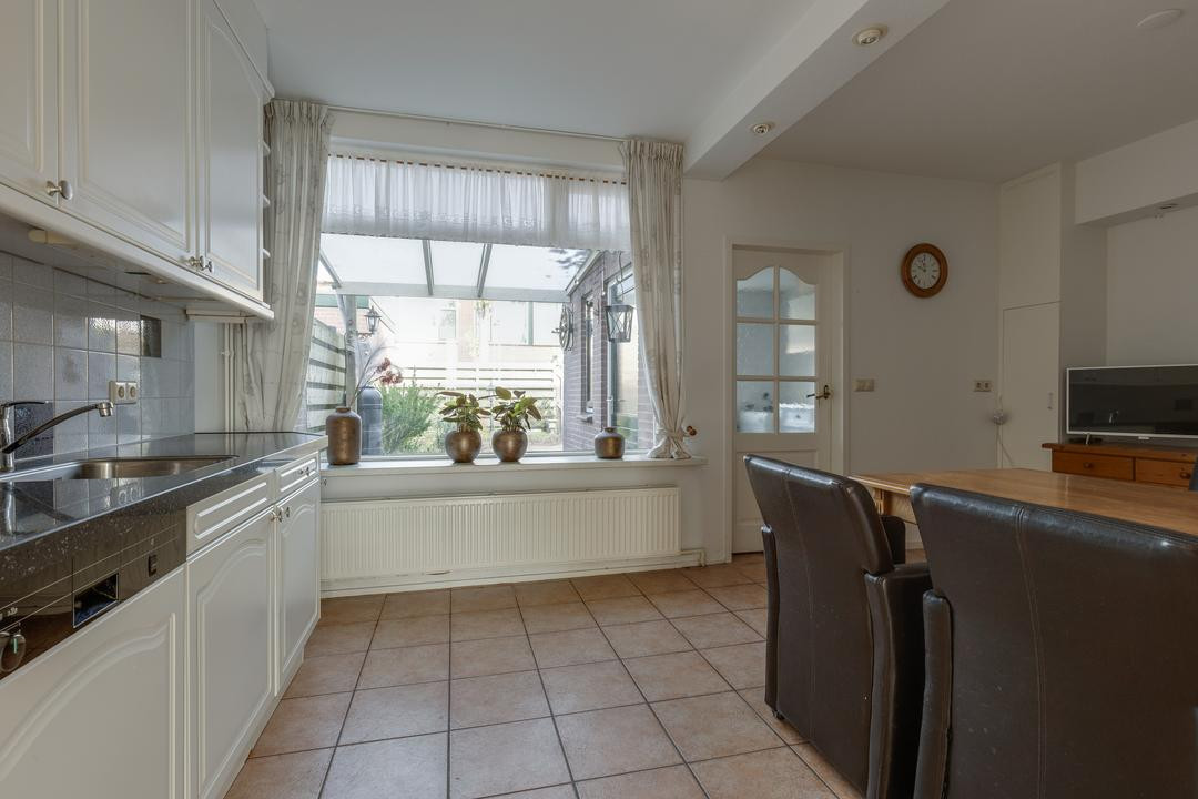 Tussenwoning te koop: Dominee Bulensstraat 12, Varsseveld