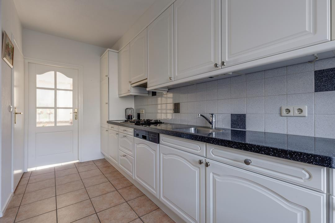 Tussenwoning te koop: Dominee Bulensstraat 12, Varsseveld