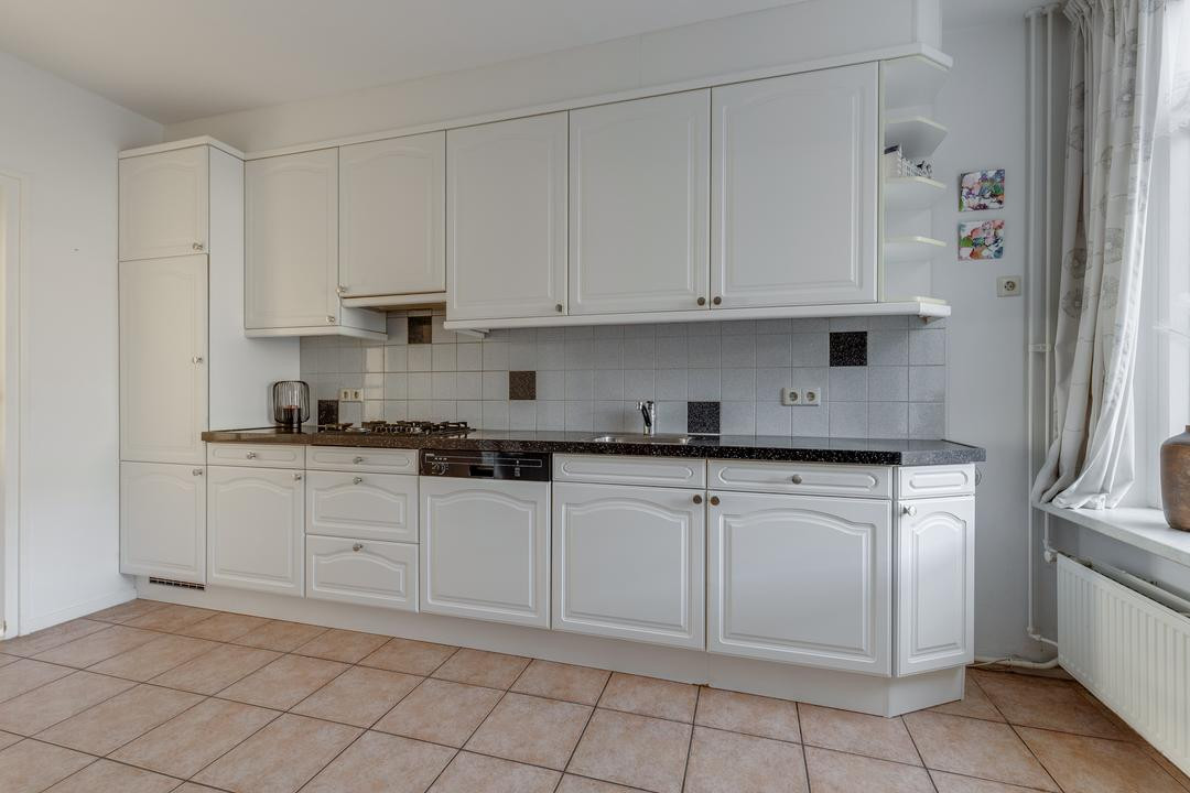 Tussenwoning te koop: Dominee Bulensstraat 12, Varsseveld