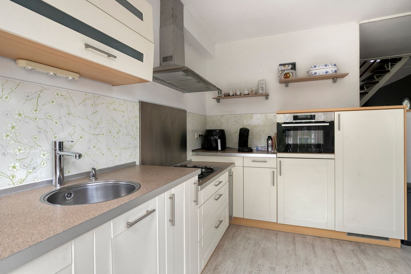 Tussenwoning te koop: Kamillestraat 19, Apeldoorn