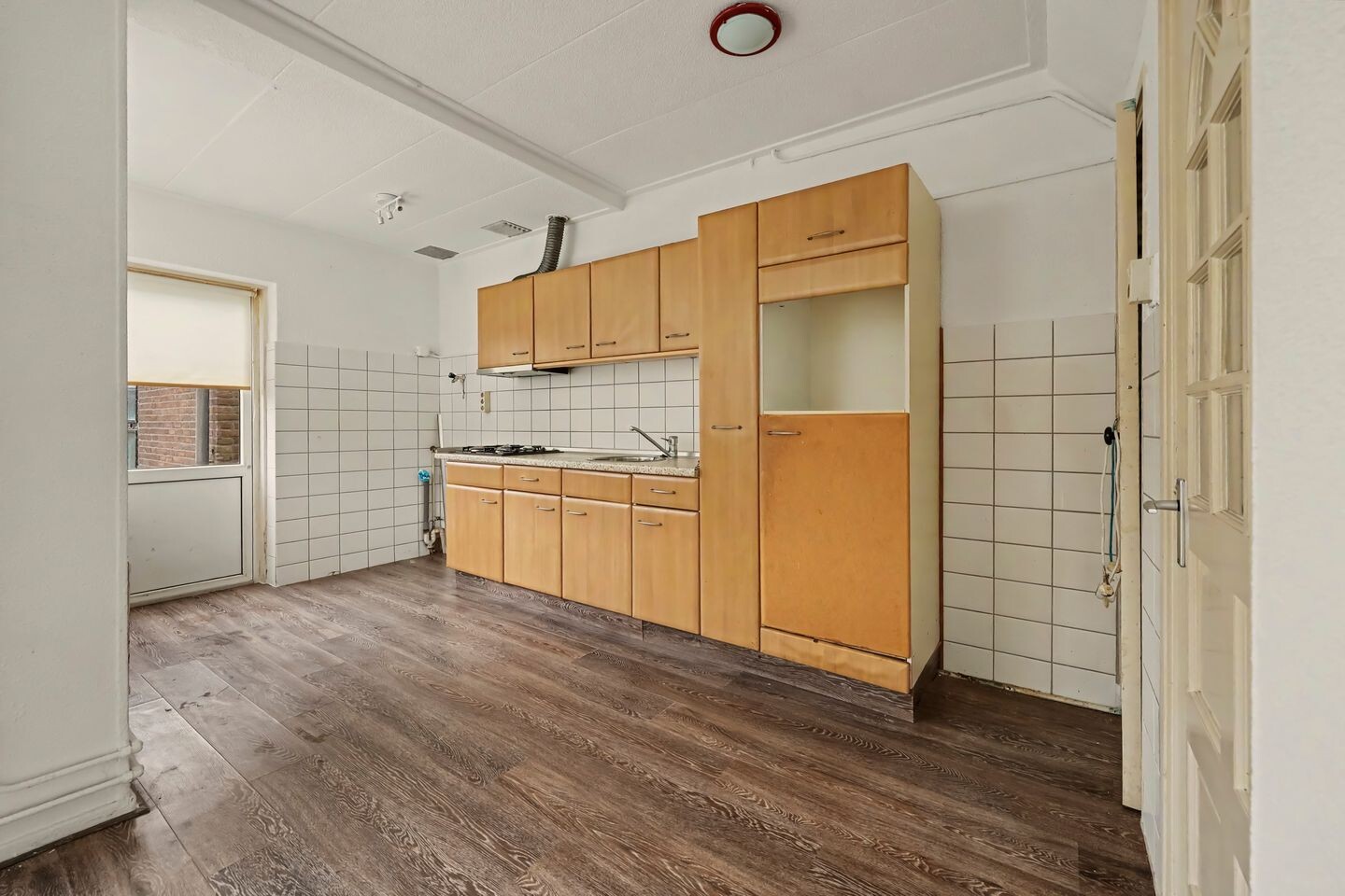 Tussenwoning te koop: W.C. Schoutenstraat 9, Enschede
