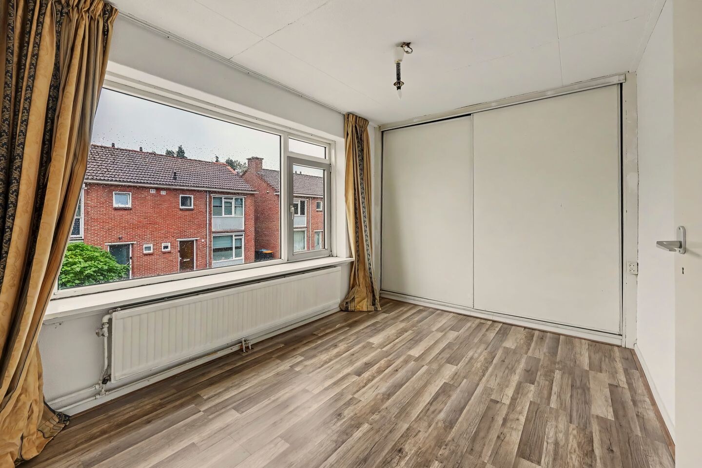 Tussenwoning te koop: W.C. Schoutenstraat 9, Enschede