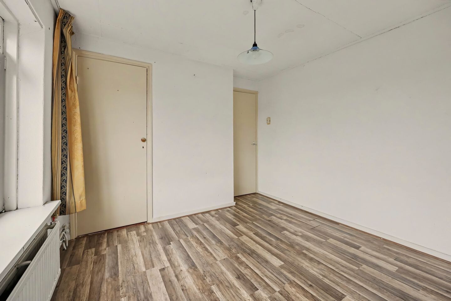 Tussenwoning te koop: W.C. Schoutenstraat 9, Enschede