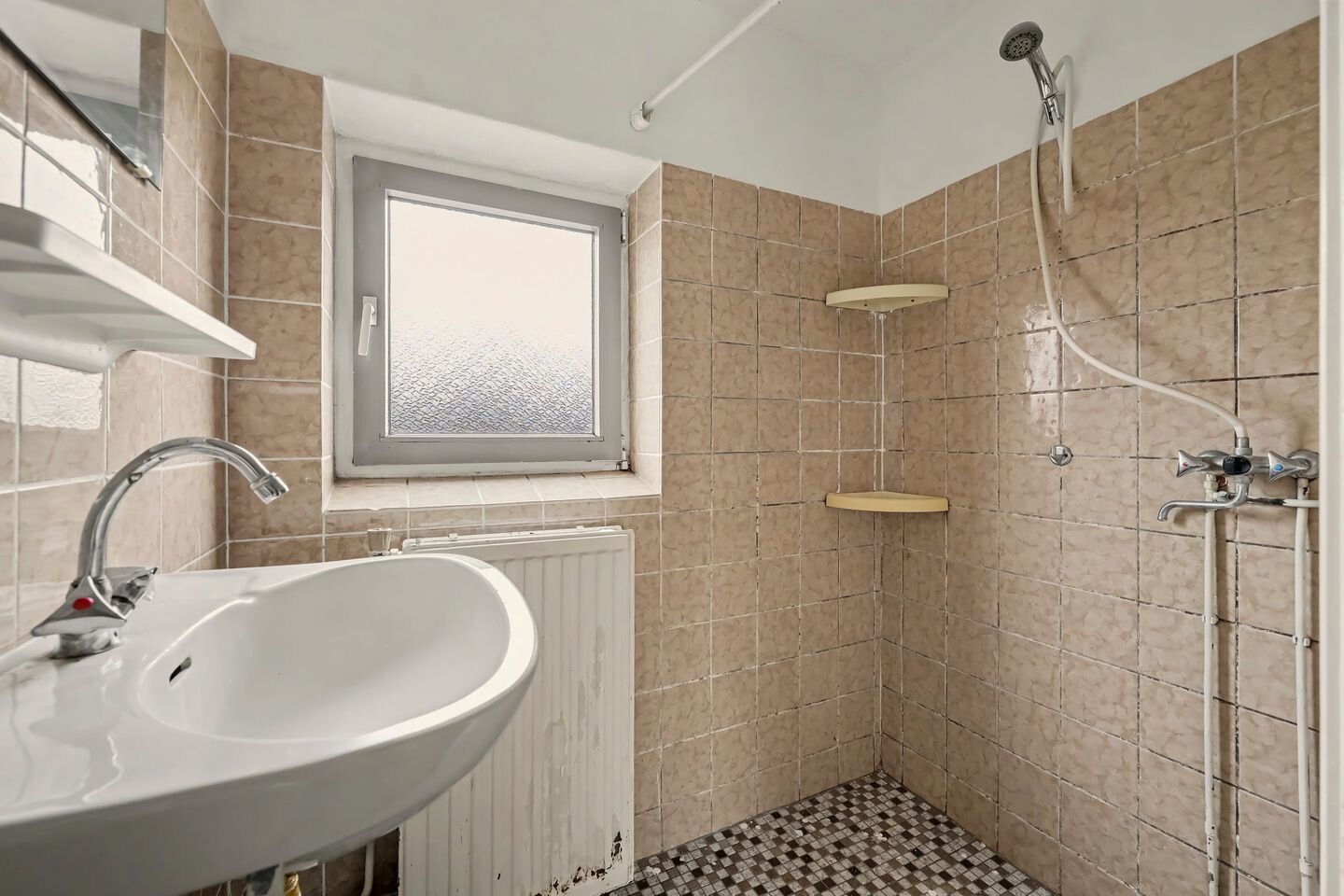 Tussenwoning te koop: W.C. Schoutenstraat 9, Enschede