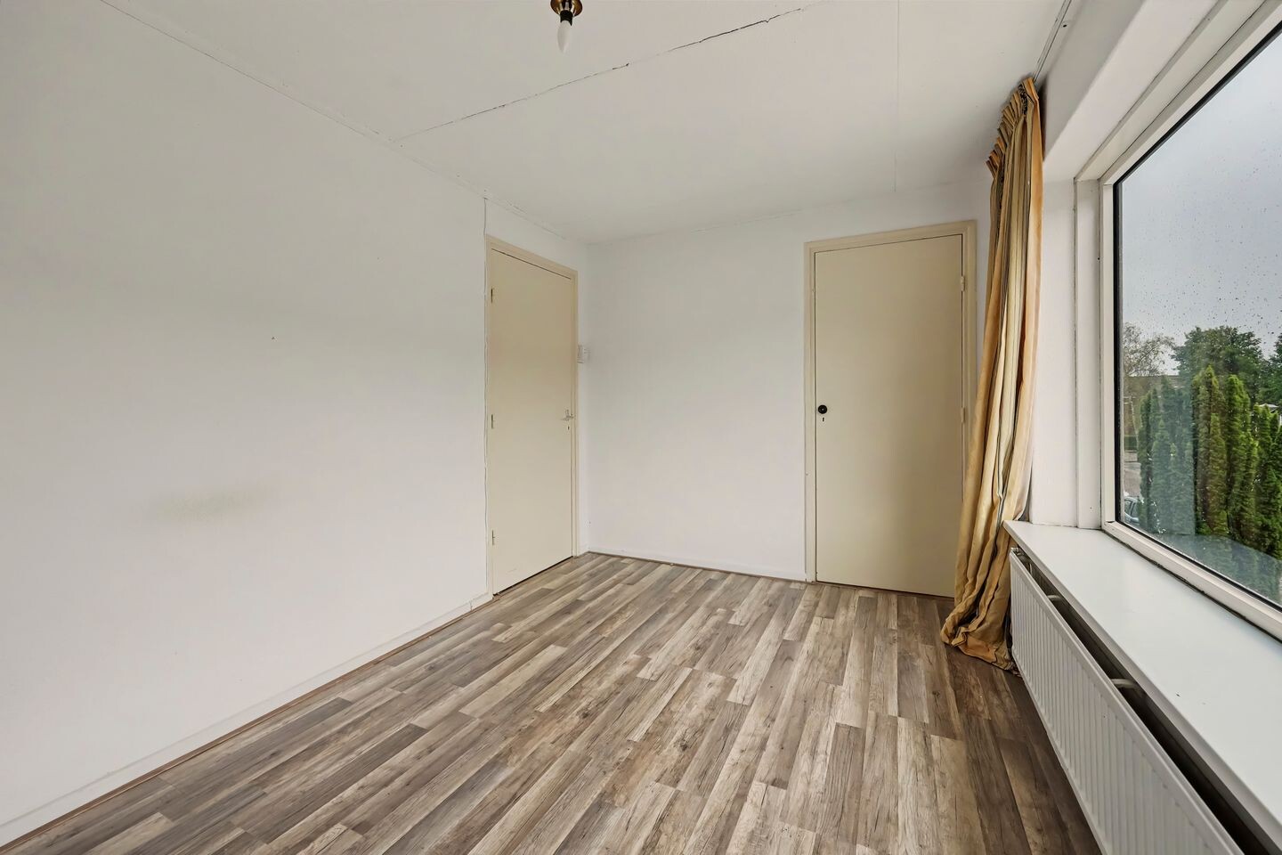 Tussenwoning te koop: W.C. Schoutenstraat 9, Enschede