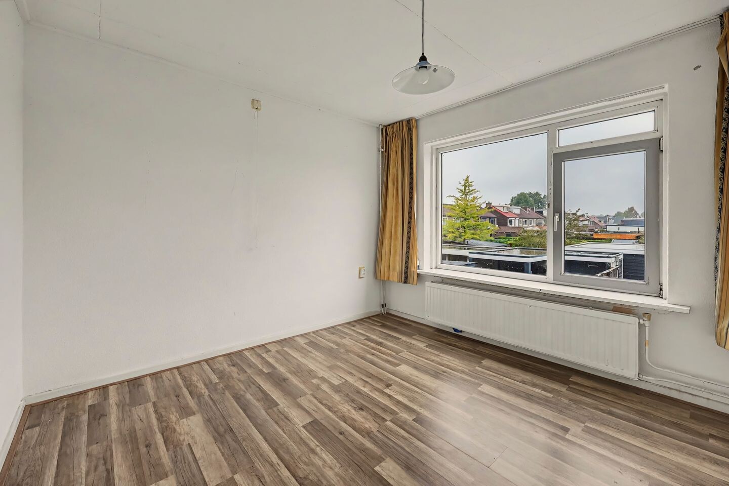 Tussenwoning te koop: W.C. Schoutenstraat 9, Enschede