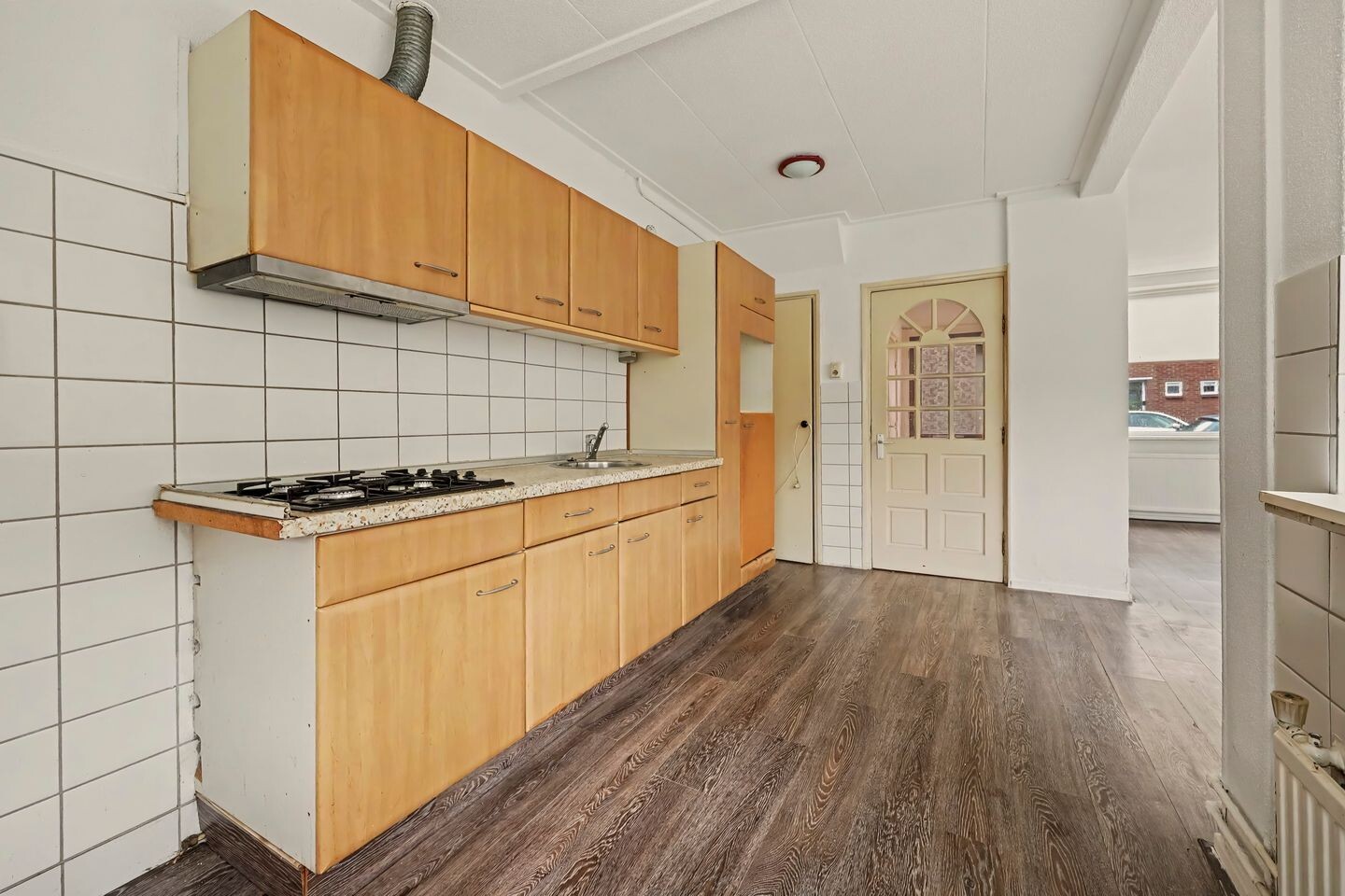 Tussenwoning te koop: W.C. Schoutenstraat 9, Enschede