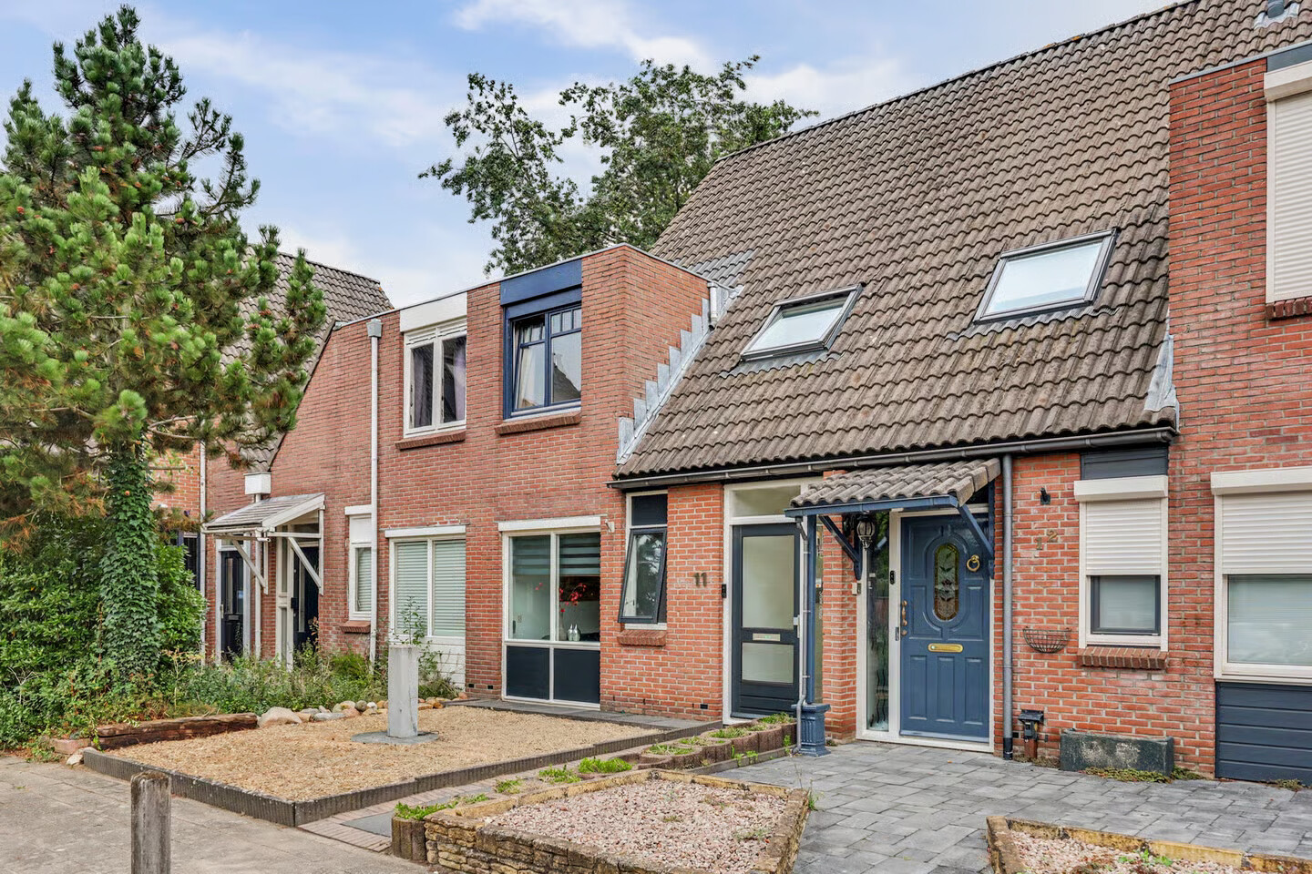 Tussenwoning te koop: Dievelaarshoek 11, Enschede