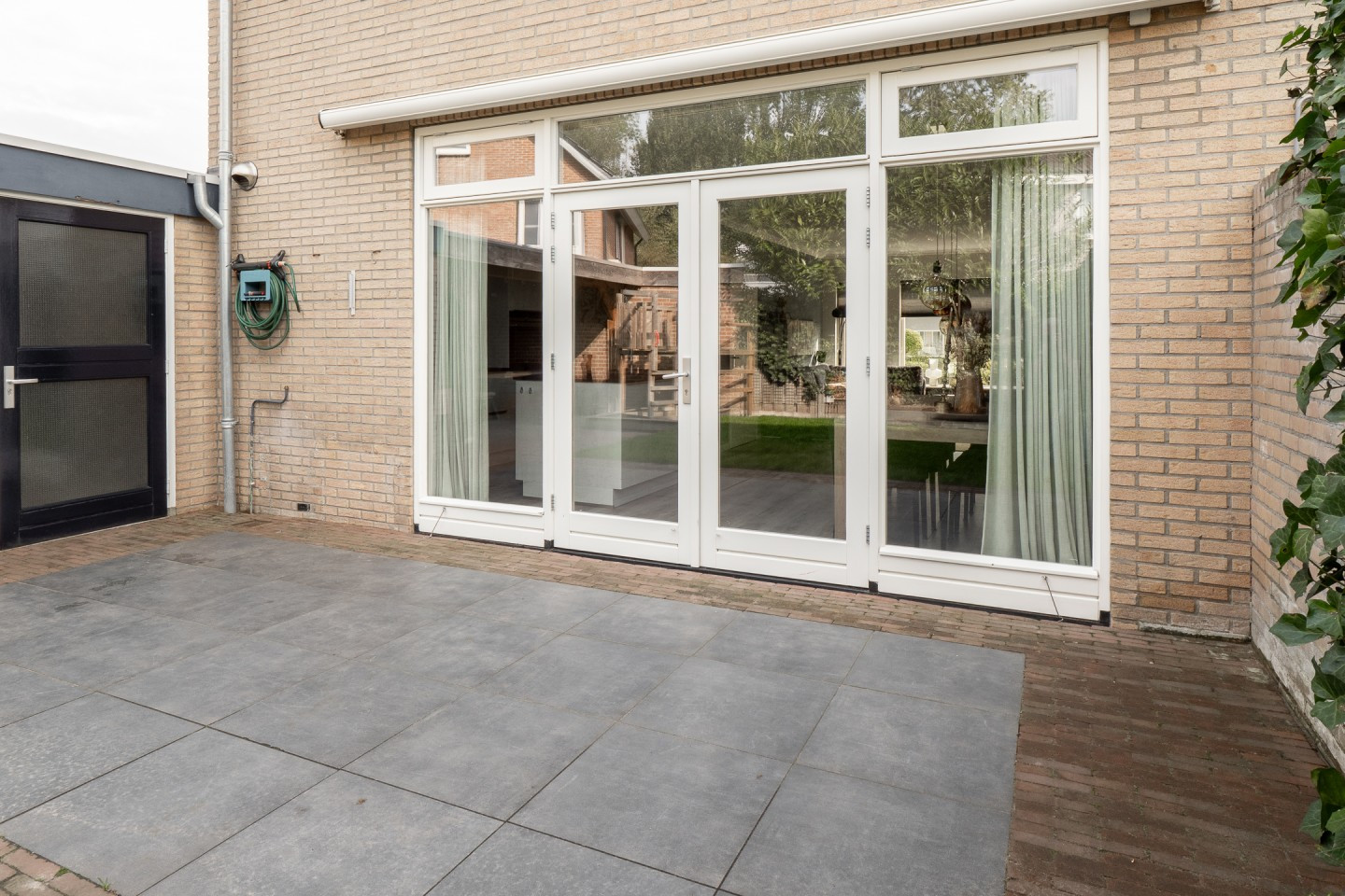 Twee-onder-één-kap te koop: Louis Bouwmeesterstraat 106, Hengelo
