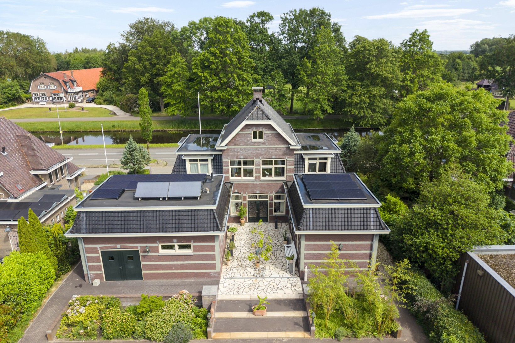 Vrijstaande woning te koop: Hoofdweg 32, De Krim