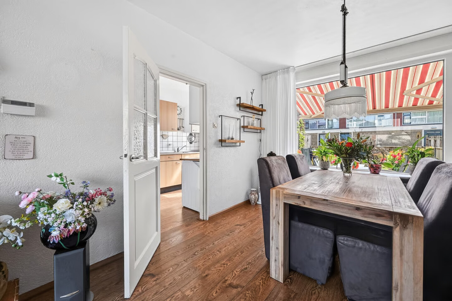 Tussenwoning te koop: De Wieken 13, Klazienaveen