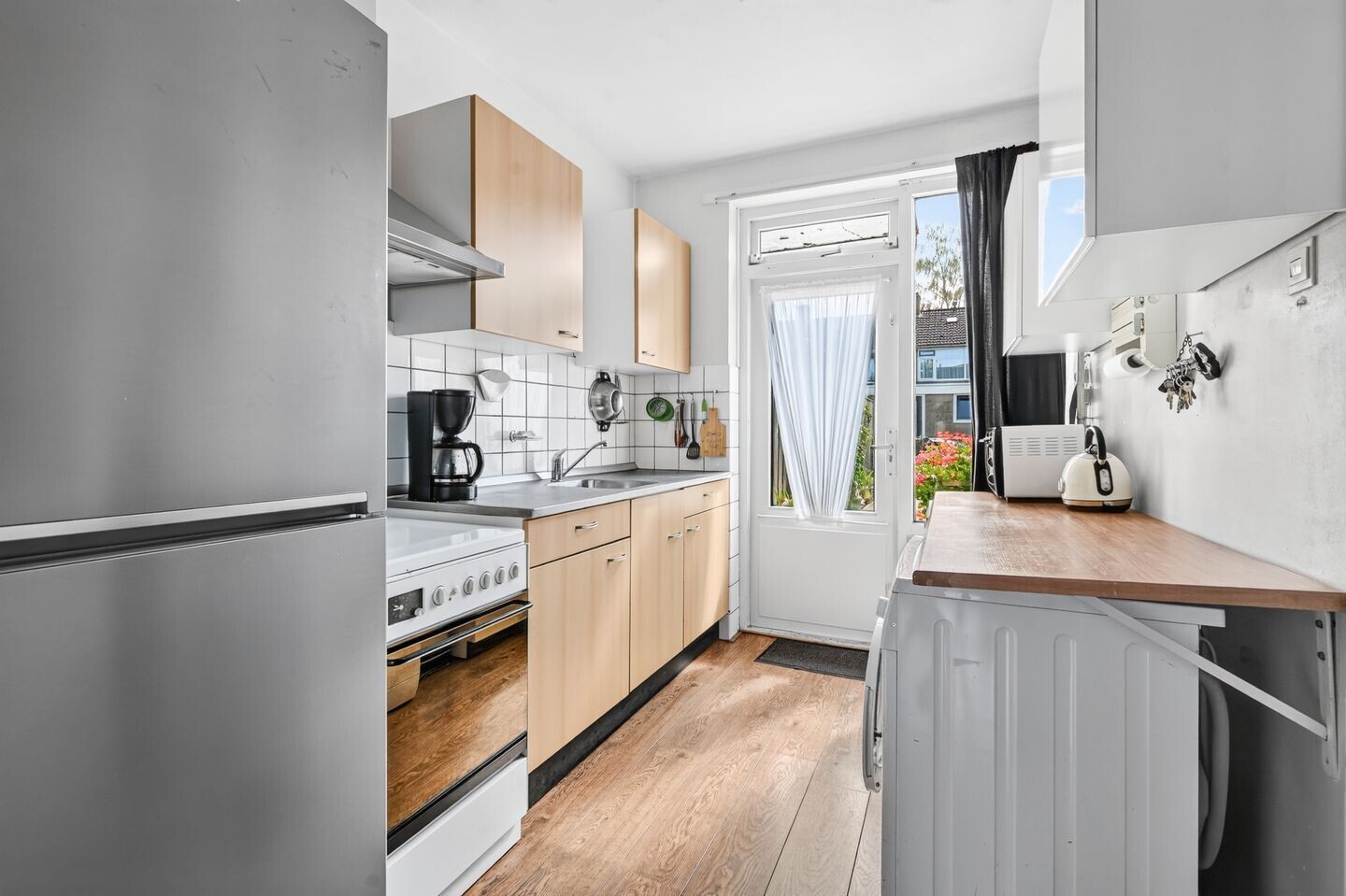 Tussenwoning te koop: De Wieken 13, Klazienaveen