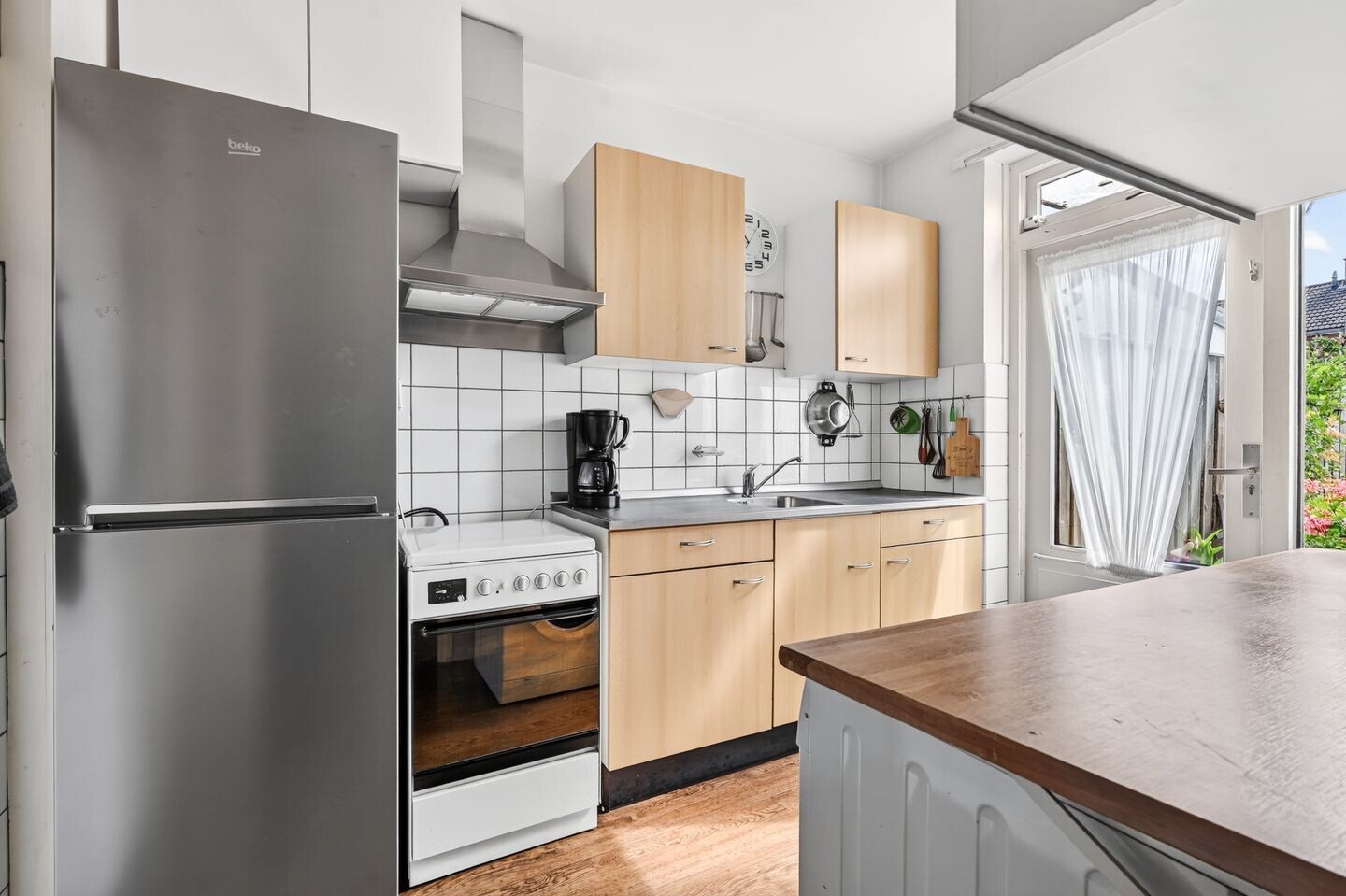 Tussenwoning te koop: De Wieken 13, Klazienaveen