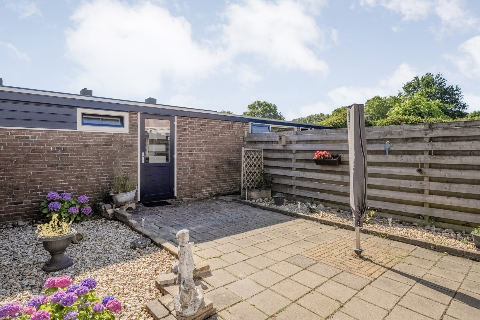 Tussenwoning te koop: Middenweg 69, Hoogeveen