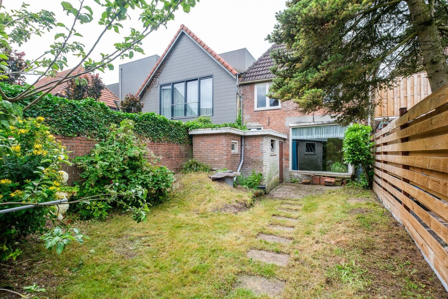 Tussenwoning te koop: Nijstad 19, Genemuiden