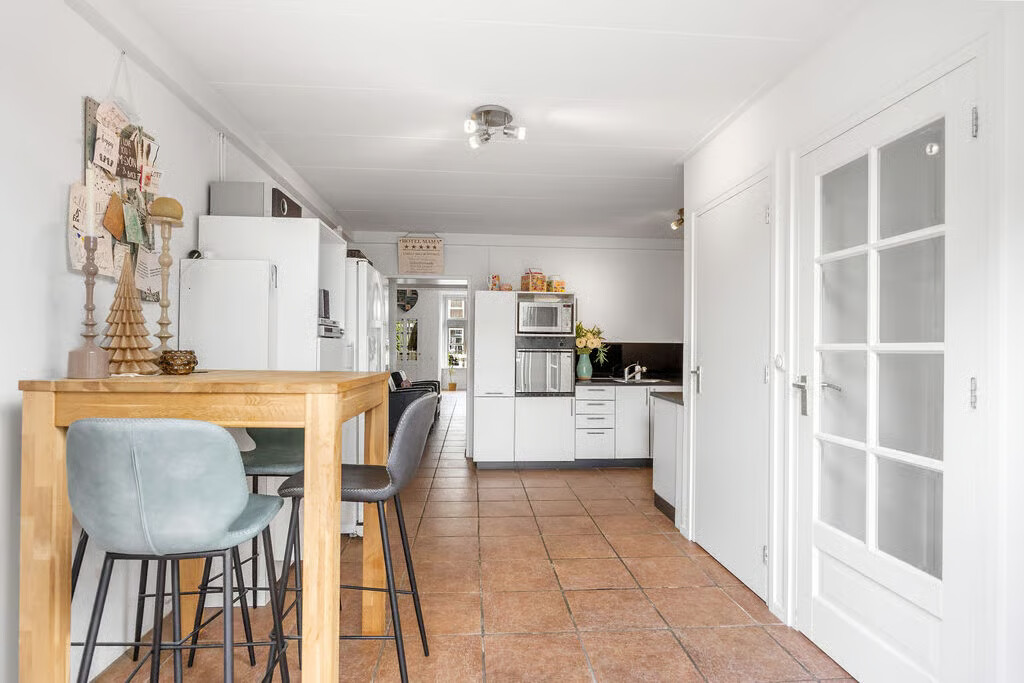 Tussenwoning te koop: Geeuwkade 48, Sneek
