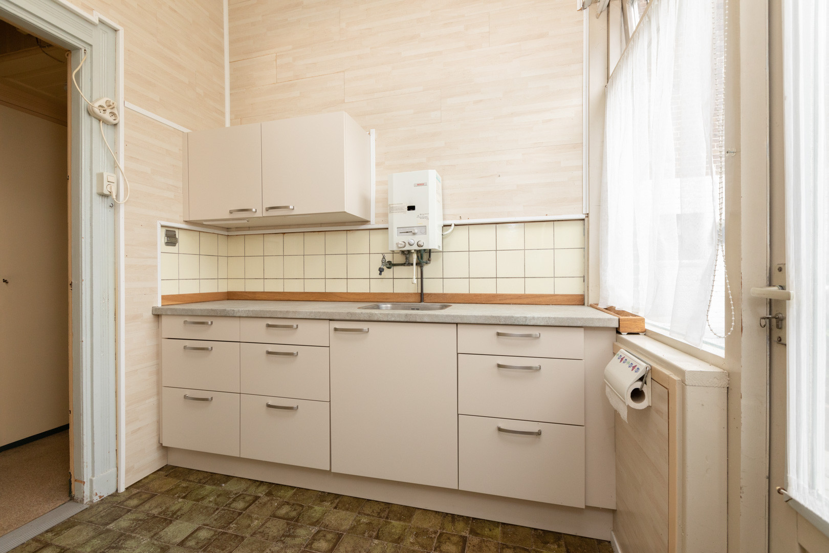 Tussenwoning te koop: Schoolstraat 27, Sneek