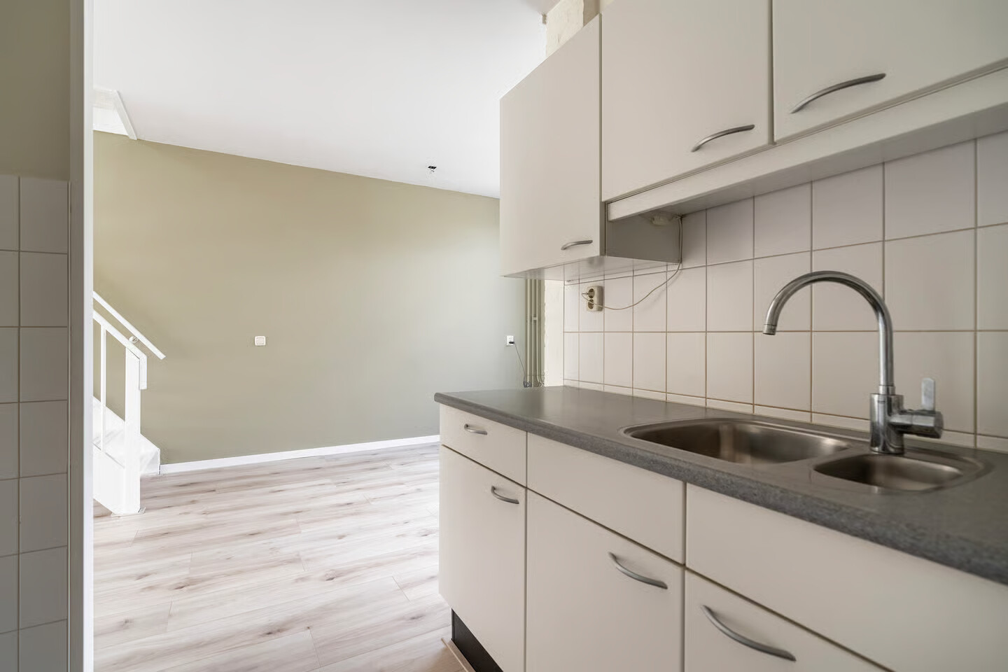 Tussenwoning te koop: POELRUIT 71, Leeuwarden