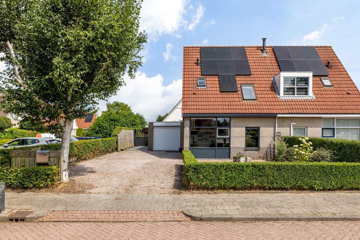 Twee-onder-één-kap te koop: De Swingel 16, Menaam