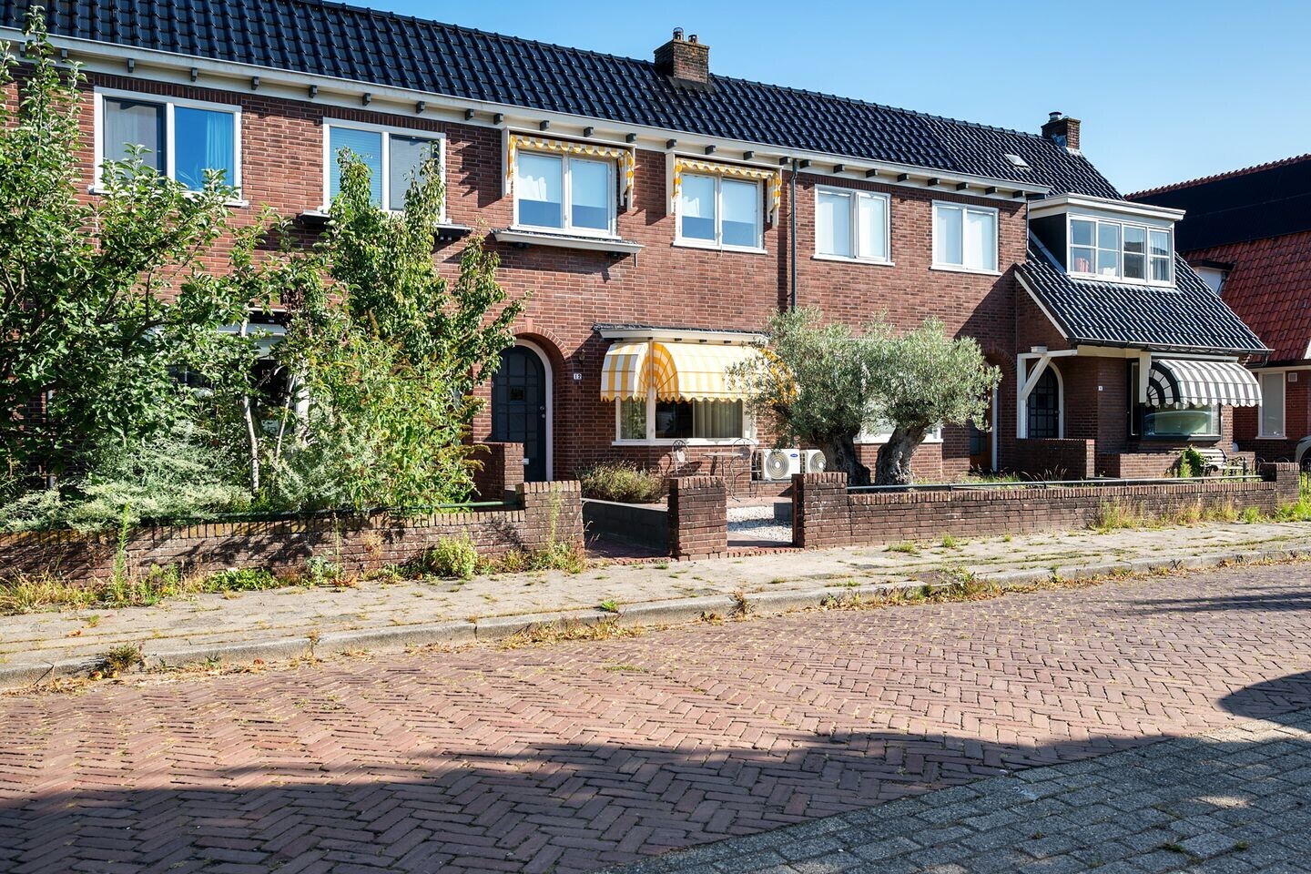 Tussenwoning te koop: Bruinsslotstraat 12, Drachten