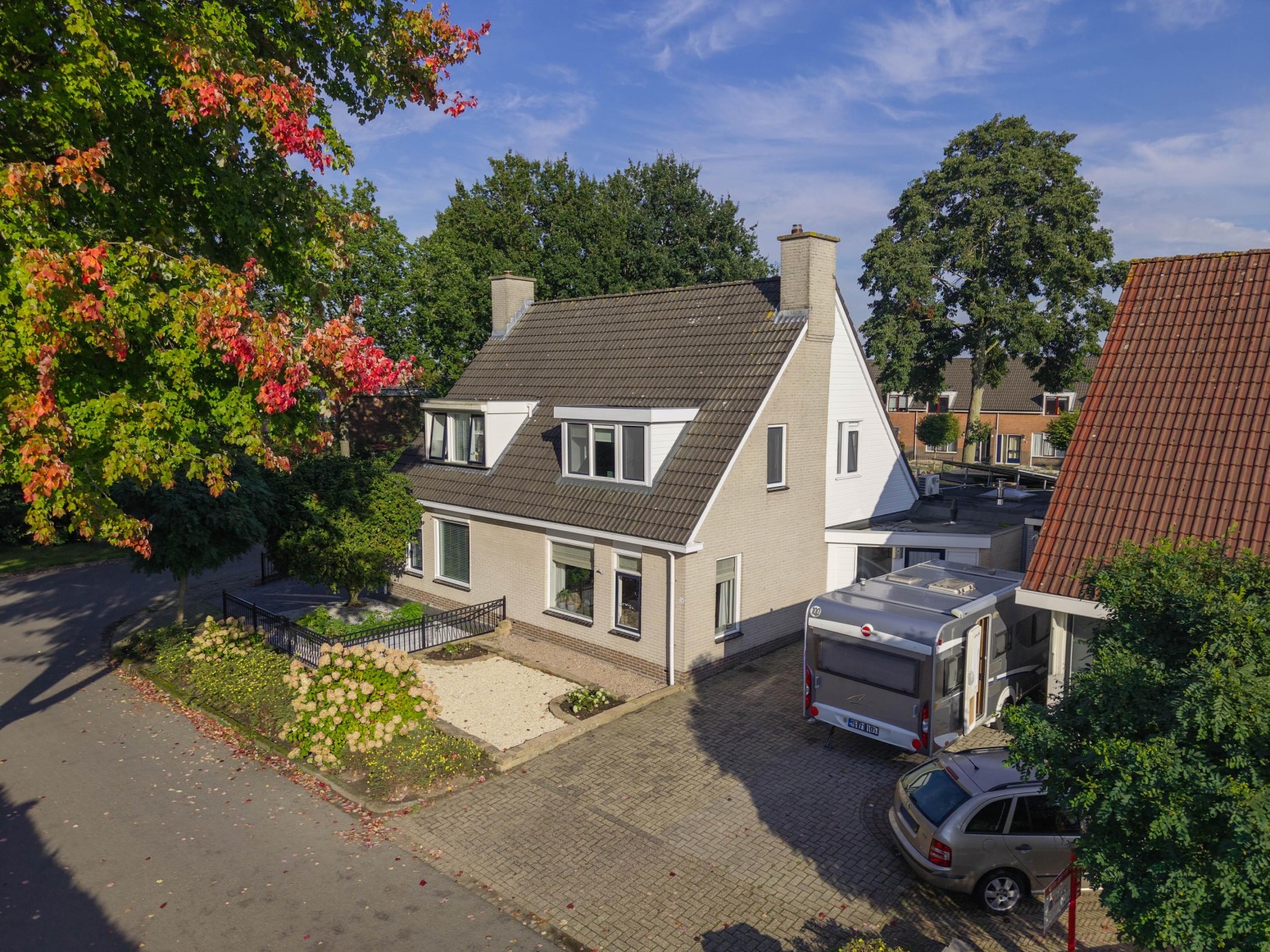 Tussenwoning te koop: De Buizerd 34, Surhuisterveen