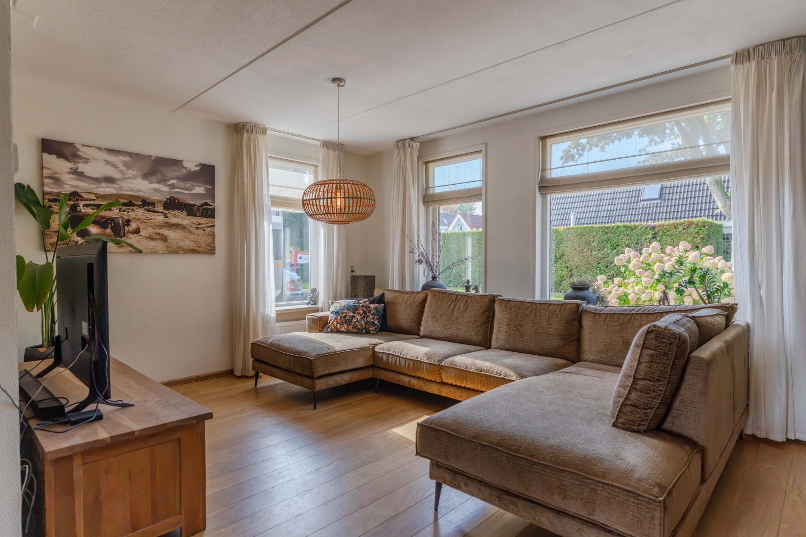 Tussenwoning te koop: De Buizerd 34, Surhuisterveen