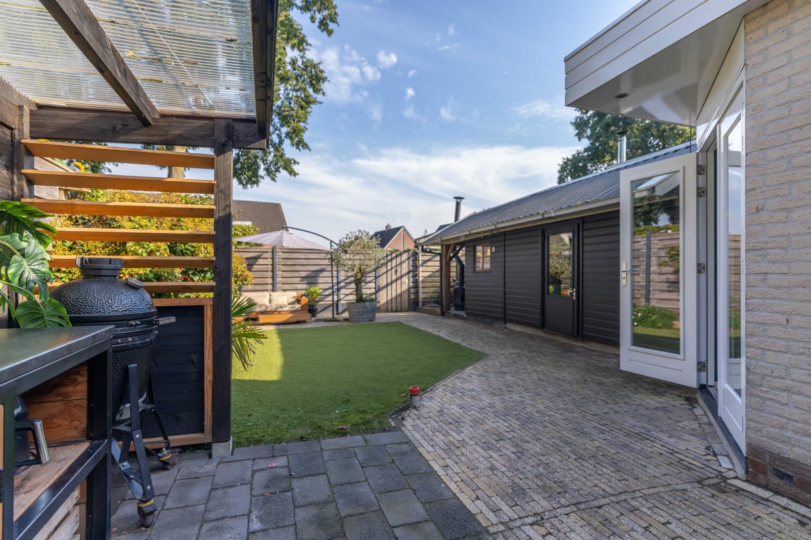 Tussenwoning te koop: De Buizerd 34, Surhuisterveen