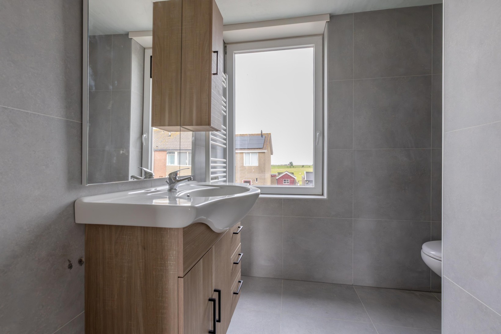 Tussenwoning te koop: Jakob de Graafstraat 22, Kollumerpomp