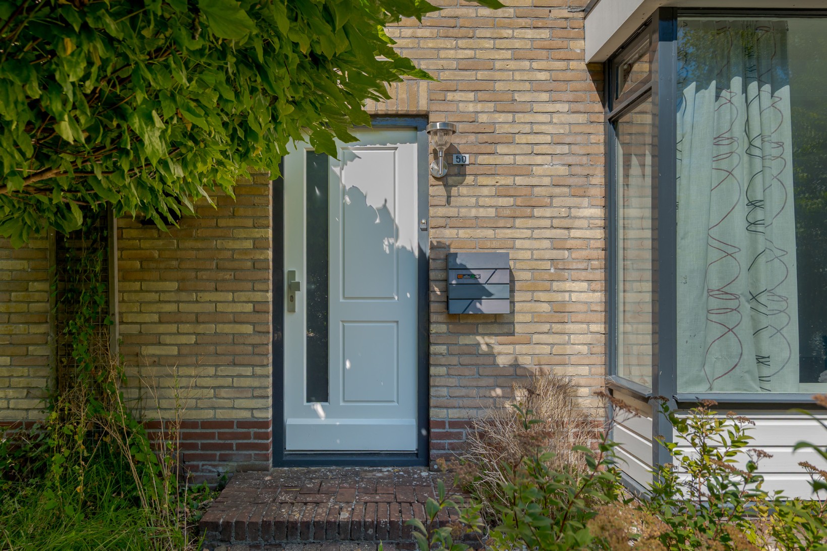 Tussenwoning te koop: Oudgenoegstraat 50, Roden