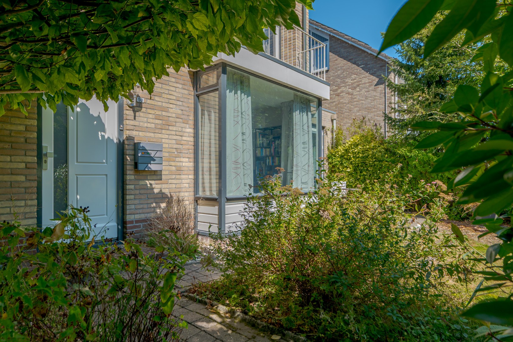 Tussenwoning te koop: Oudgenoegstraat 50, Roden