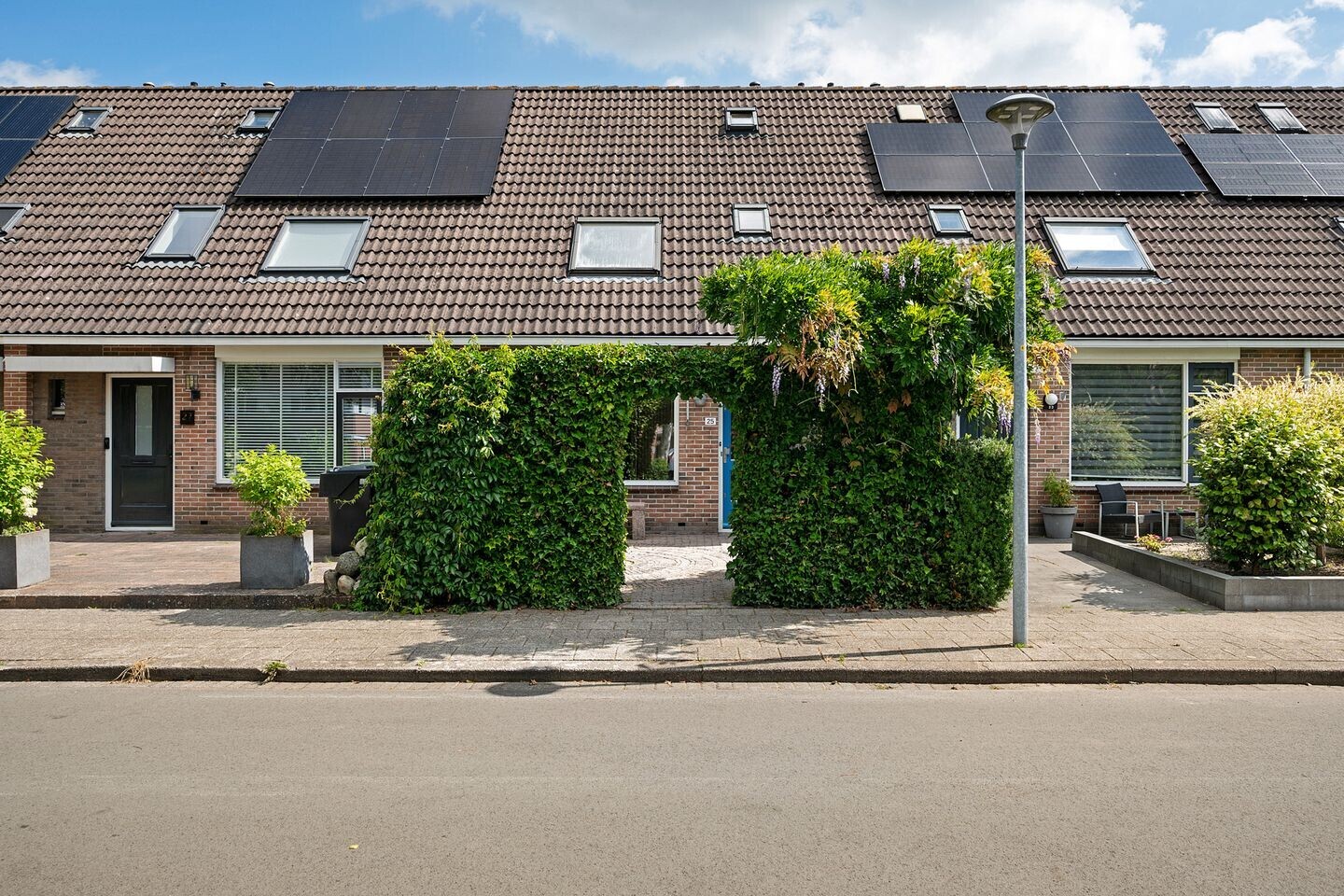 Tussenwoning te koop: Veenwortel 25, Roden