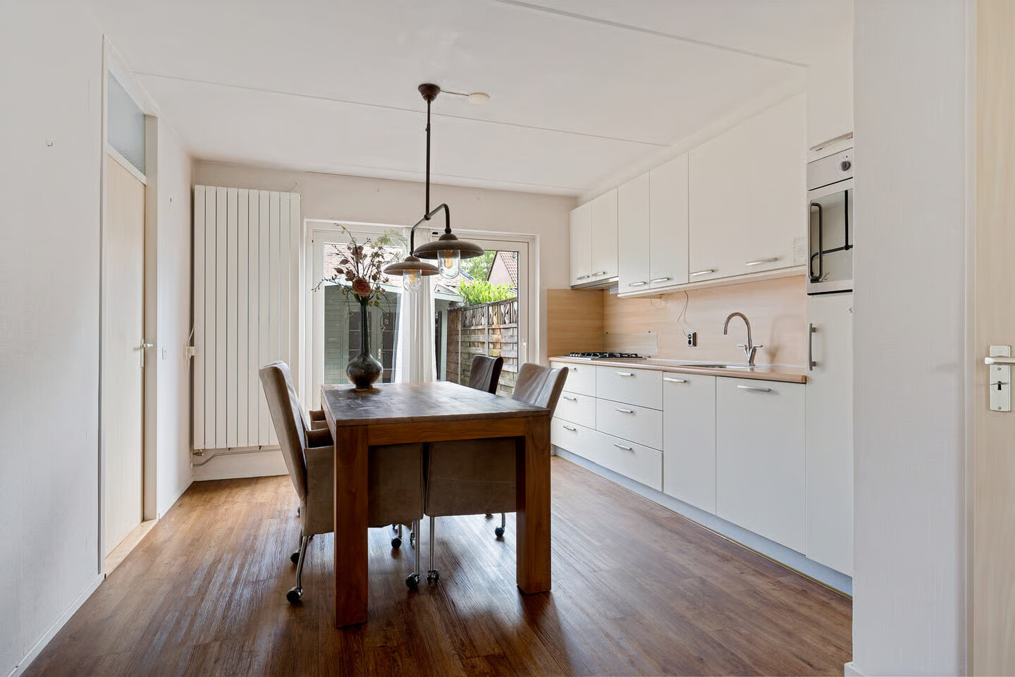 Tussenwoning te koop: Veenwortel 25, Roden