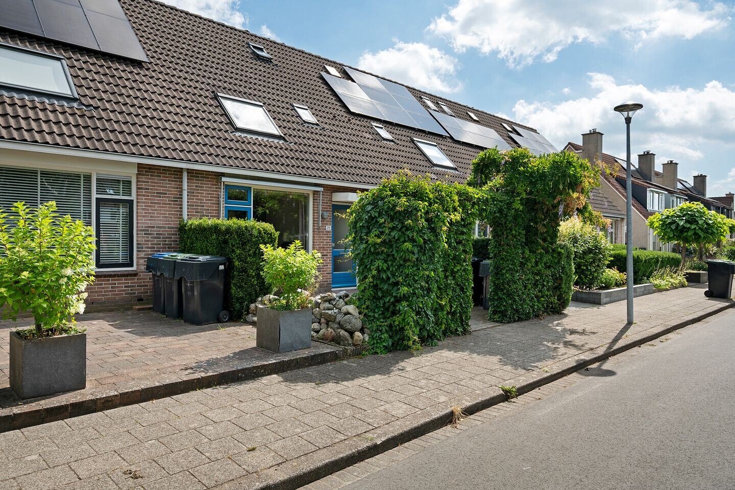 Tussenwoning te koop: Veenwortel 25, Roden