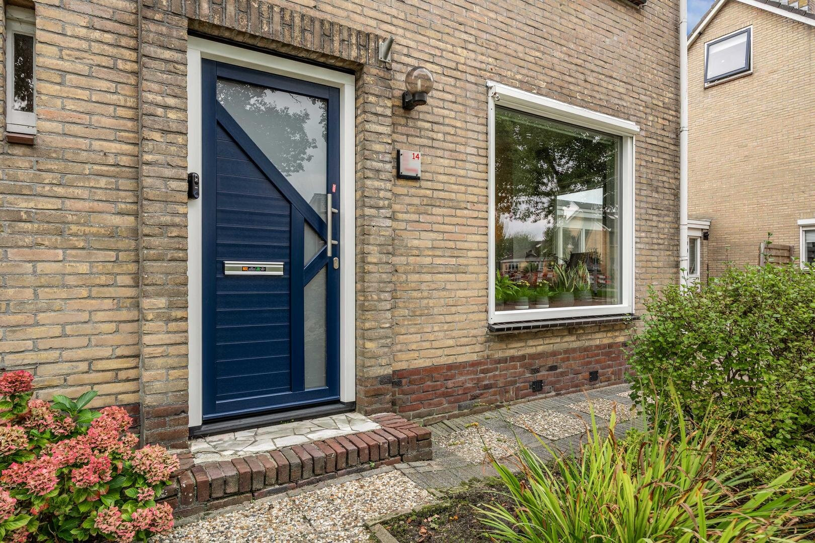 Tussenwoning te koop: H.W. Mesdagstraat 14, Nietap