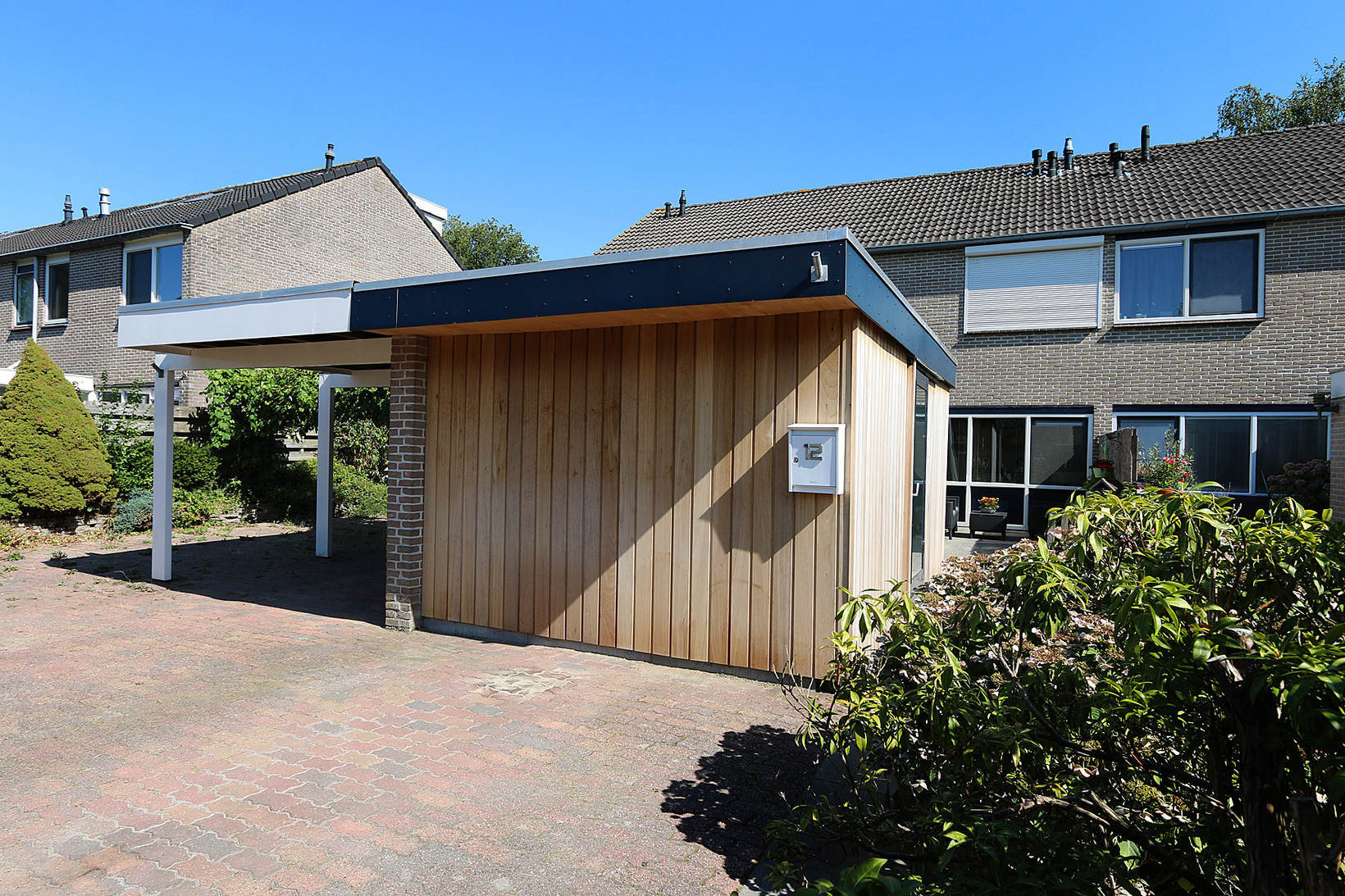 Tussenwoning te koop: Rozenstraat 12, Bovensmilde