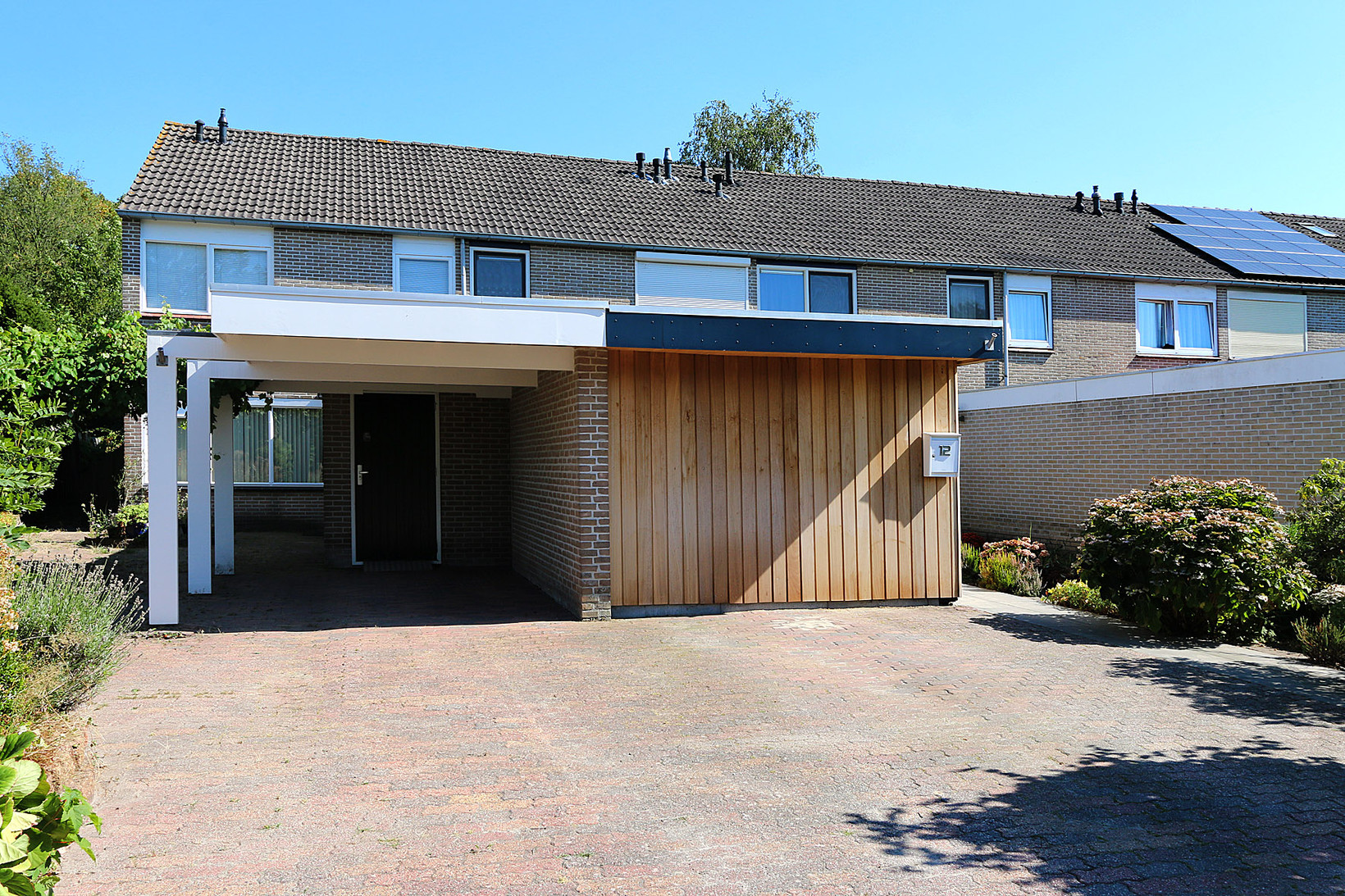 Tussenwoning te koop: Rozenstraat 12, Bovensmilde