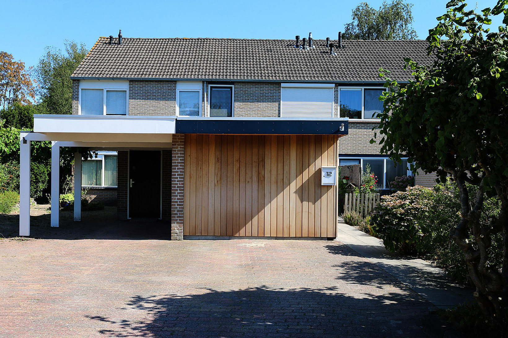 Tussenwoning te koop: Rozenstraat 12, Bovensmilde