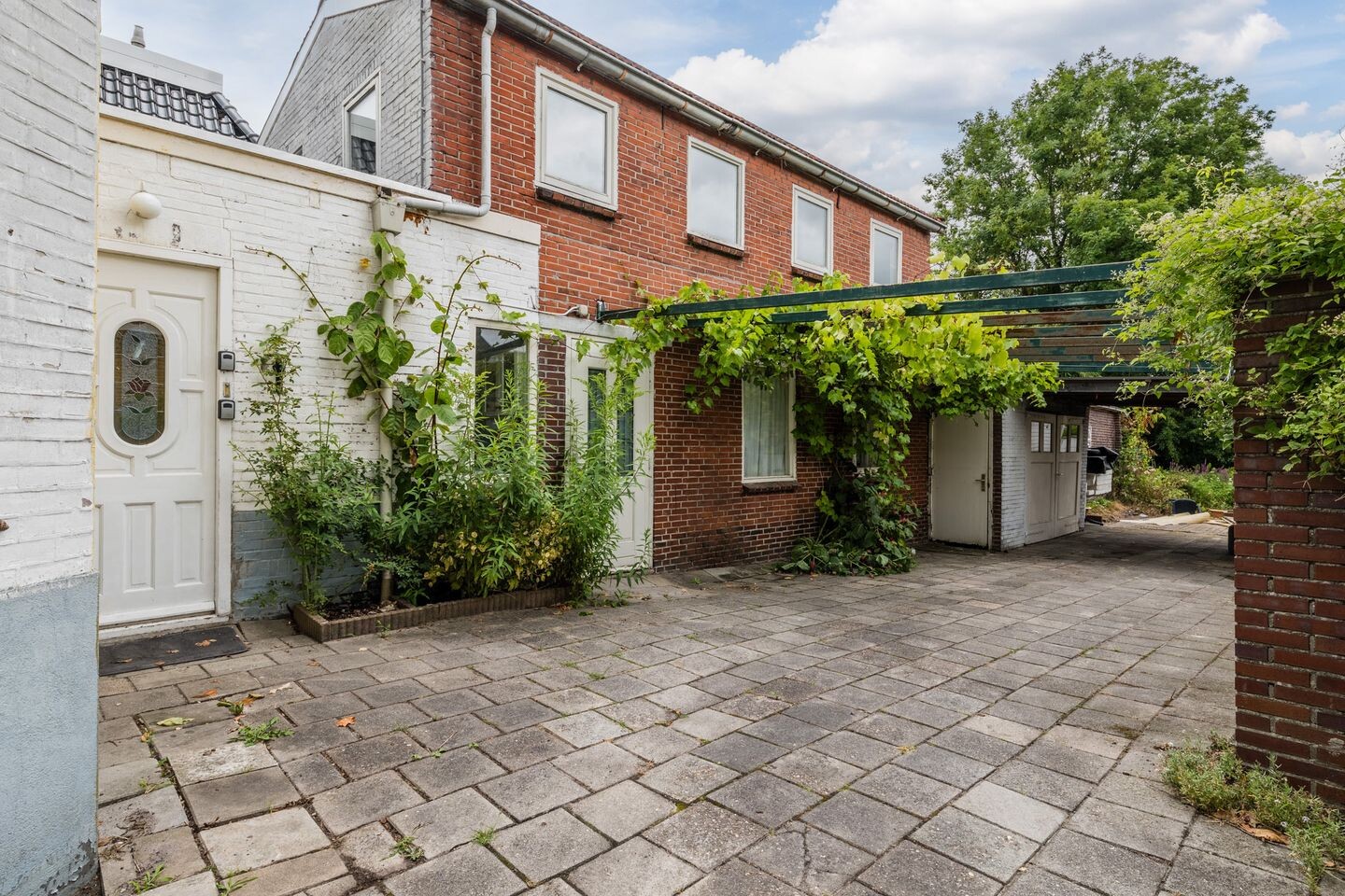 Twee-onder-één-kap te koop: Handelsstraat 28, Stadskanaal