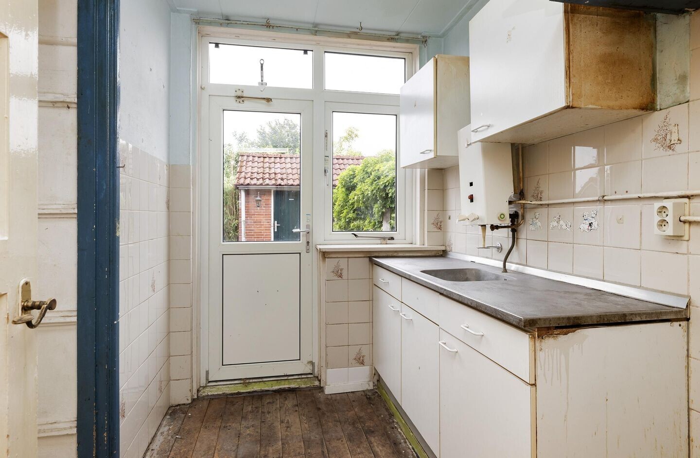 Tussenwoning te koop: M.A. de Ruyterlaan 76, Winschoten